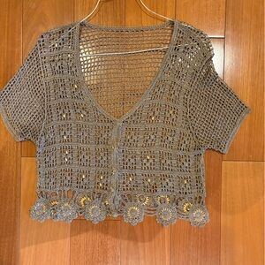 Tan, beaded crop top perfect for summer or festival season.